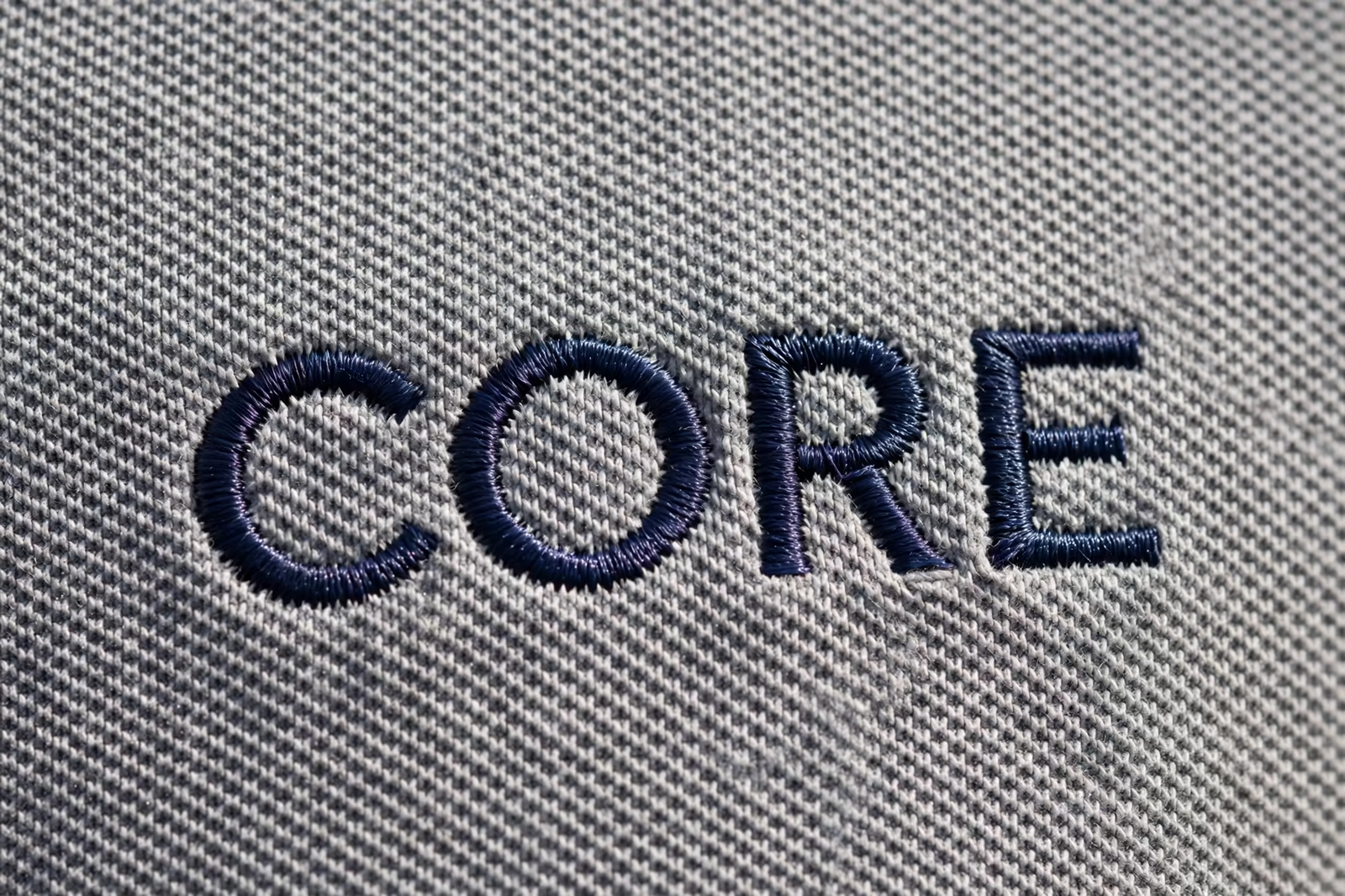 Embroidered lettering with open counters in Bangladesh