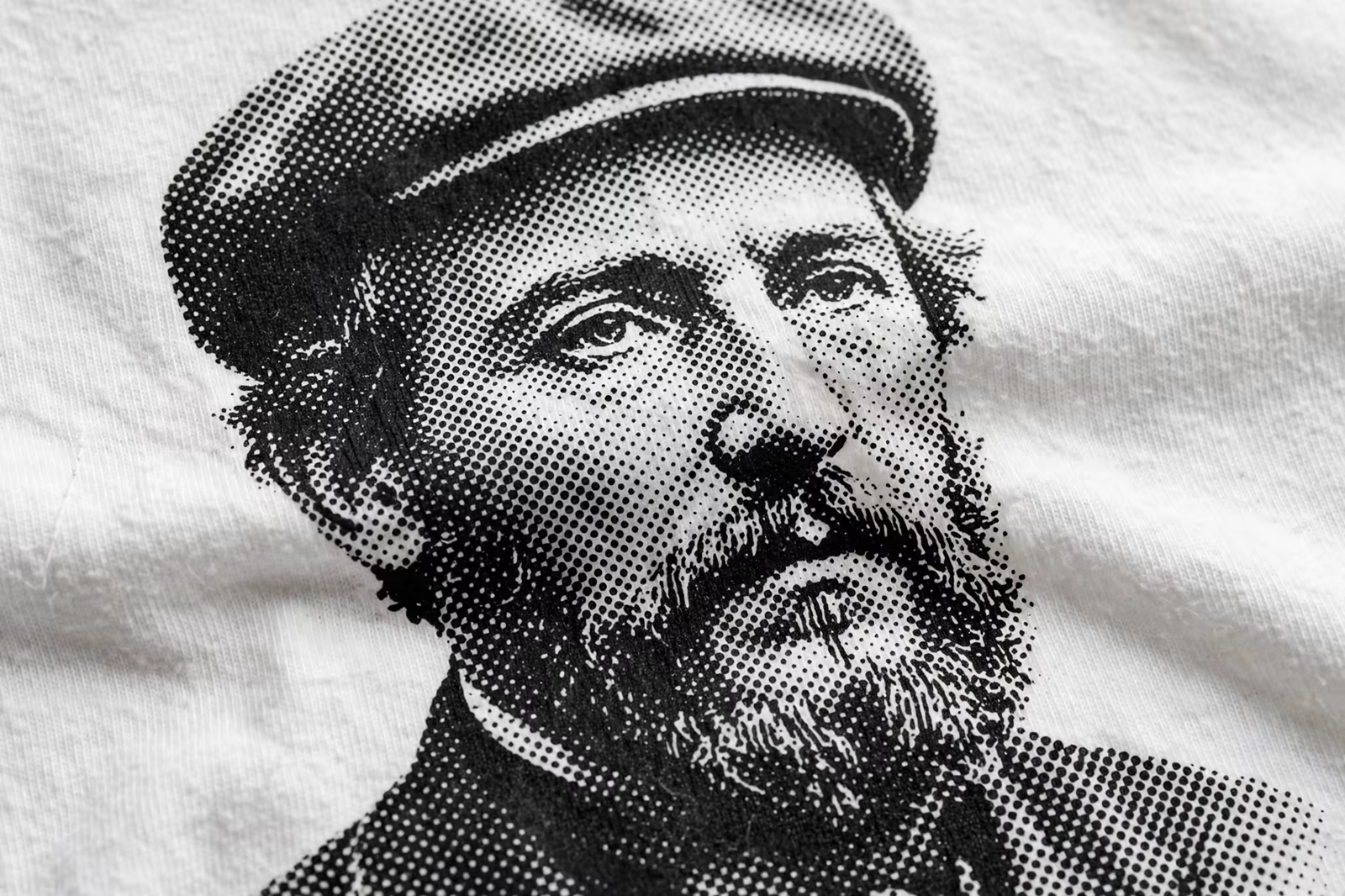 Halftone portrait print closeup showing ink dots in Bangladesh