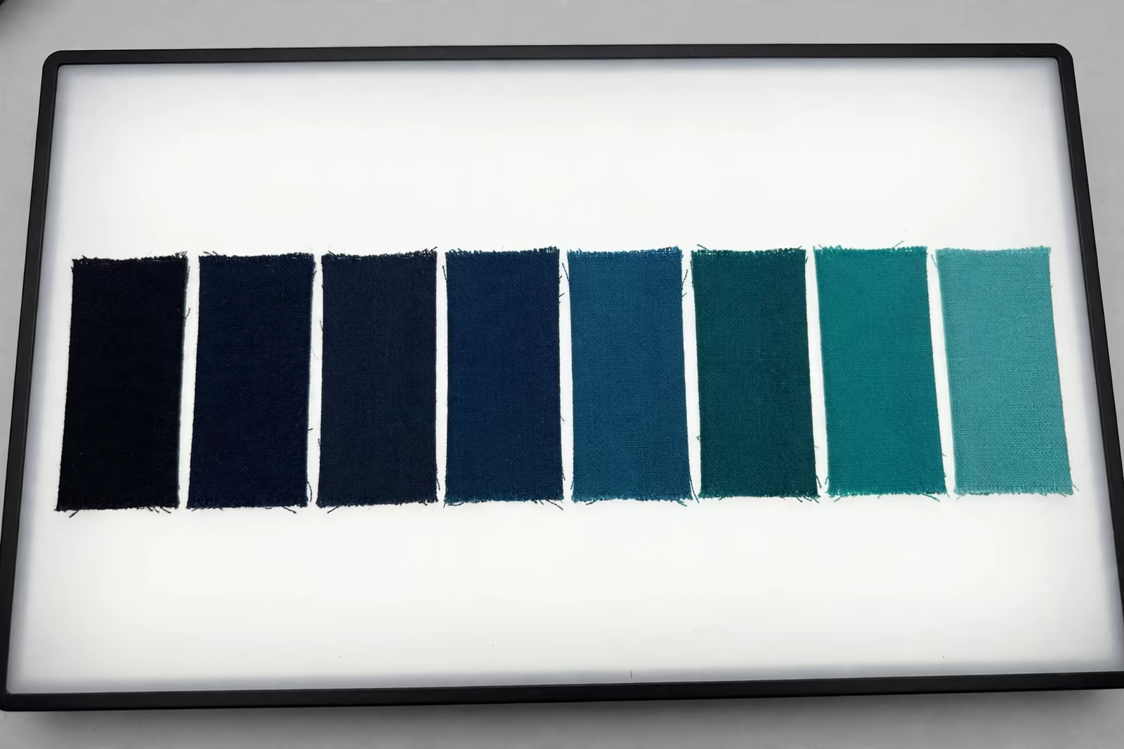 Lab dip swatches in graduated shades in Bangladesh