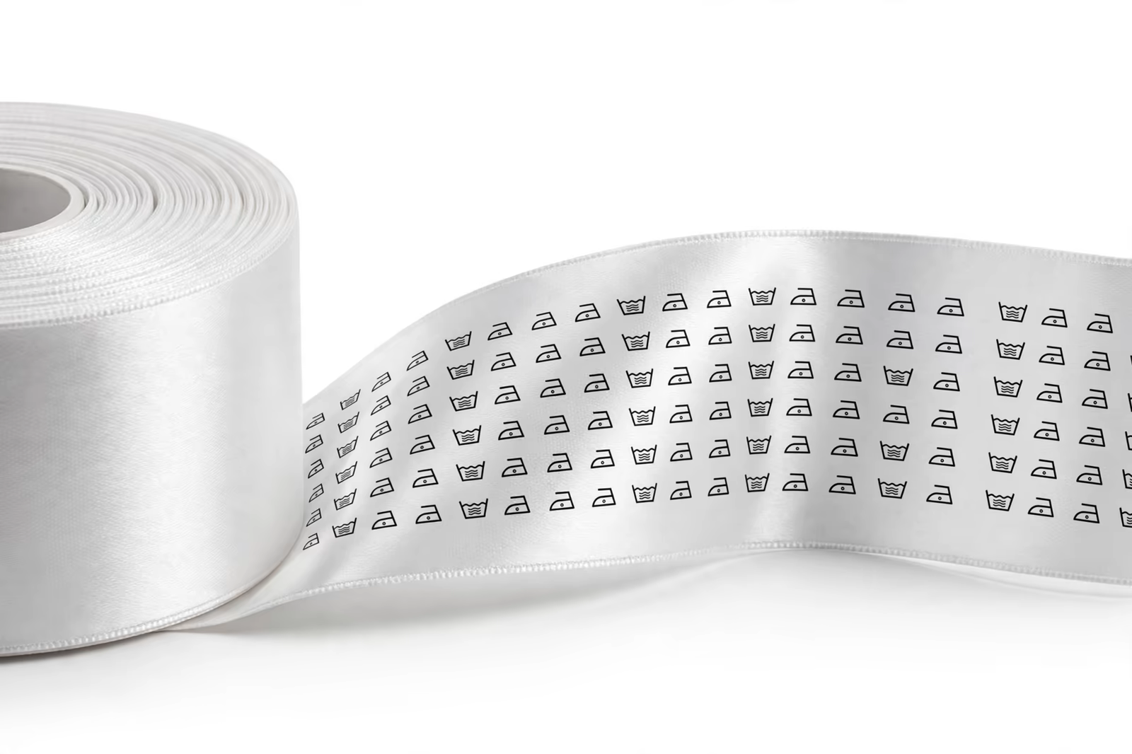 Printed satin care labels on a roll from a manufacturer in Bangladesh