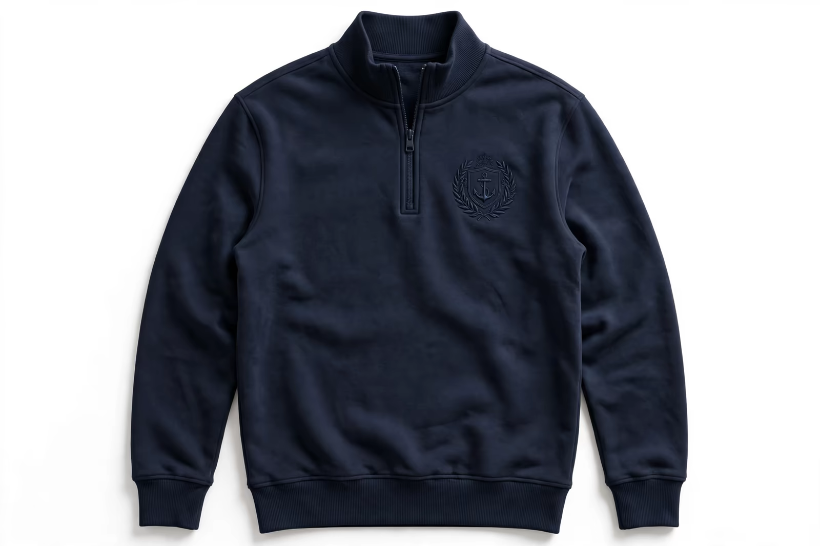 Tone on tone embroidered crest on a quarter zip in Bangladesh
