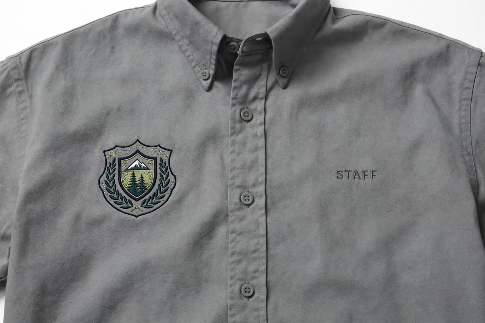 Work shirt with embroidered name and crest in Bangladesh